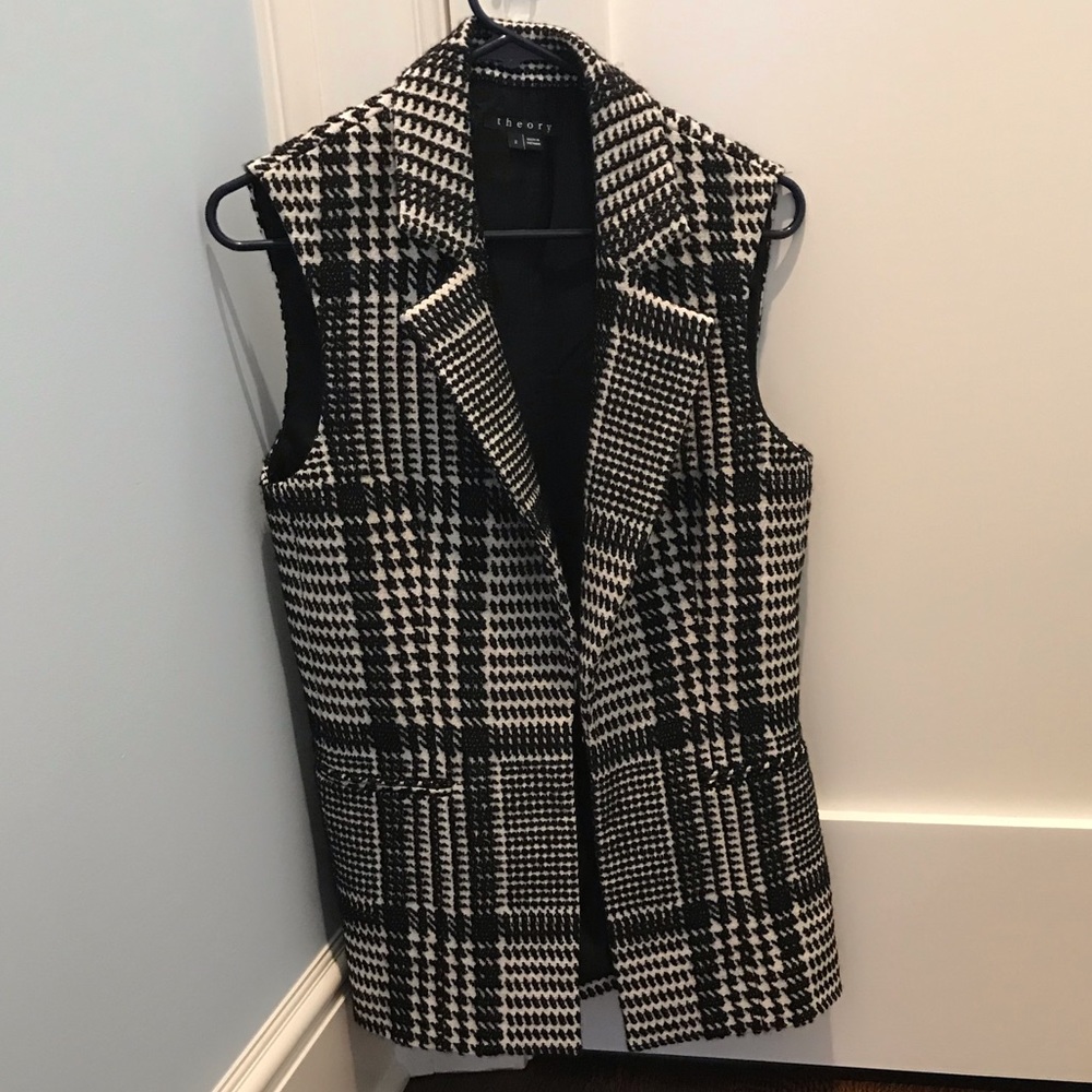 Long theory vest. Lightly worn.